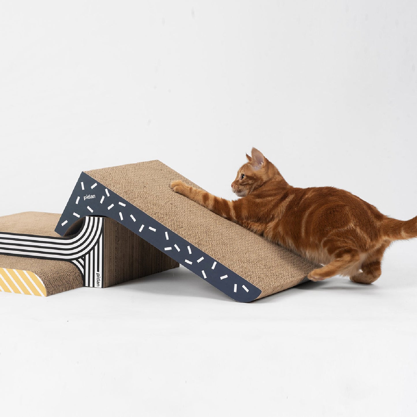 Pidan New Zealand 3-in-1 combo cat scratcher for playing, featuring multiple scratching surfaces and cozy areas for cats.