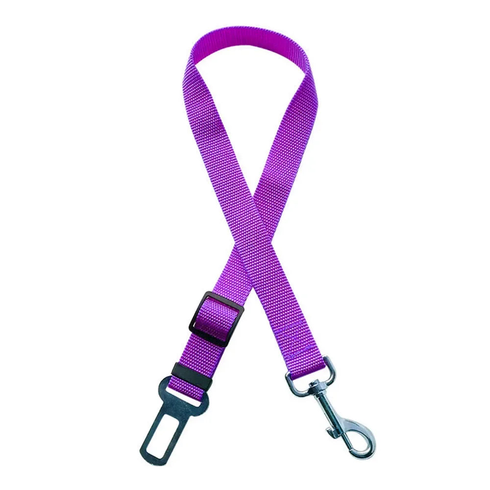 Habicare adjustable dog vehicle harness in various colors, featuring secure straps and buckles for safe car travel.