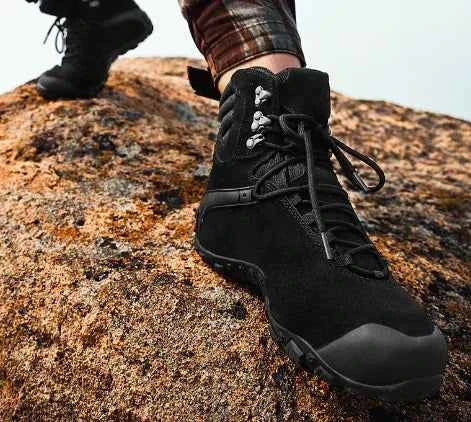 Women's waterproof hiking boots by Mead's Supply & Equipment Outfitters, lightweight climbing shoes in black, durable outdoor footwear