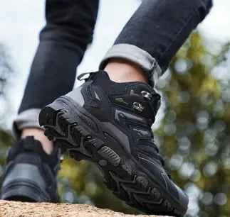 WOLFF waterproof high-top trekking shoes by Mead's Supply & Equipment Outfitters, black hiking boots with enhanced grip and rugged sole.