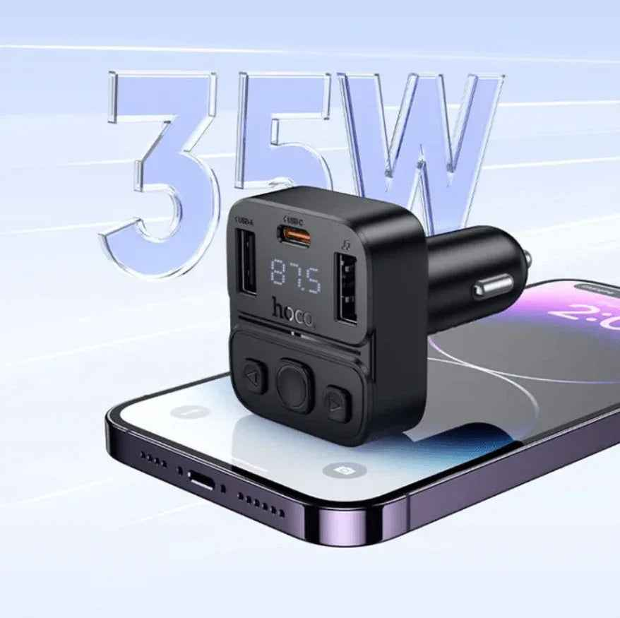 Techplus Hoco E87 dual port 35W car Bluetooth FM transmitter connected to a vehicle's dashboard.