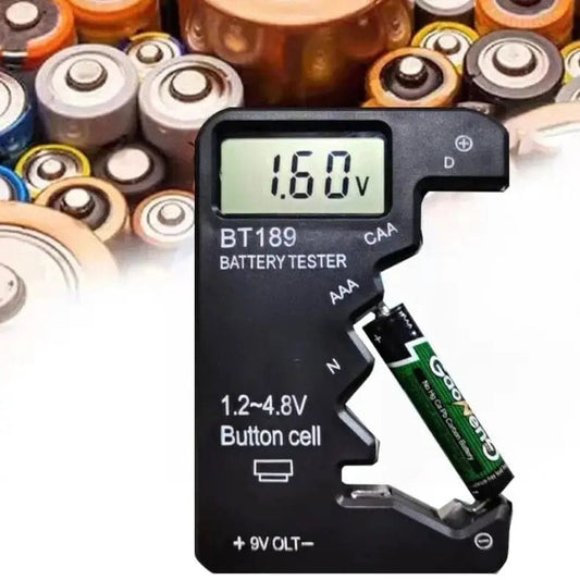 Battery tester for button cell, AA, AAA, C, D, 9V, 14500, 16340 batteries from That Watch Shop, showing testing probes and display.