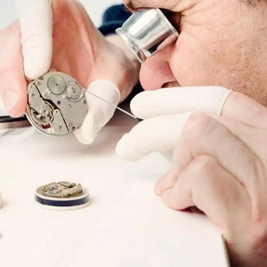 Set of 100 finger tip gloves for watch tools, designed for delicate handling and precision in watch repair.