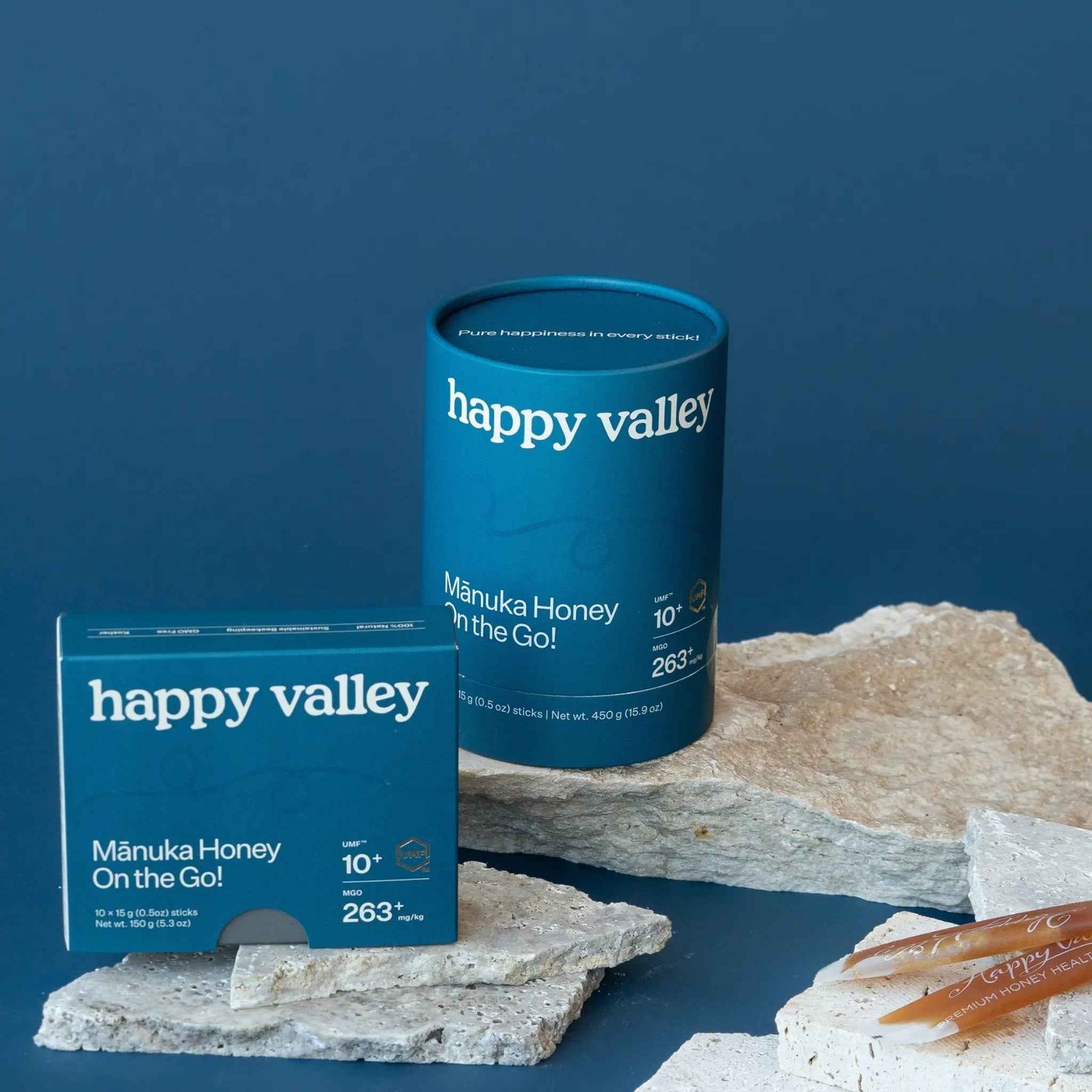 Happy Valley Honey Mānuka Honey packets with UMF 10+ honey sticks, shown in a portable pack for on-the-go use.