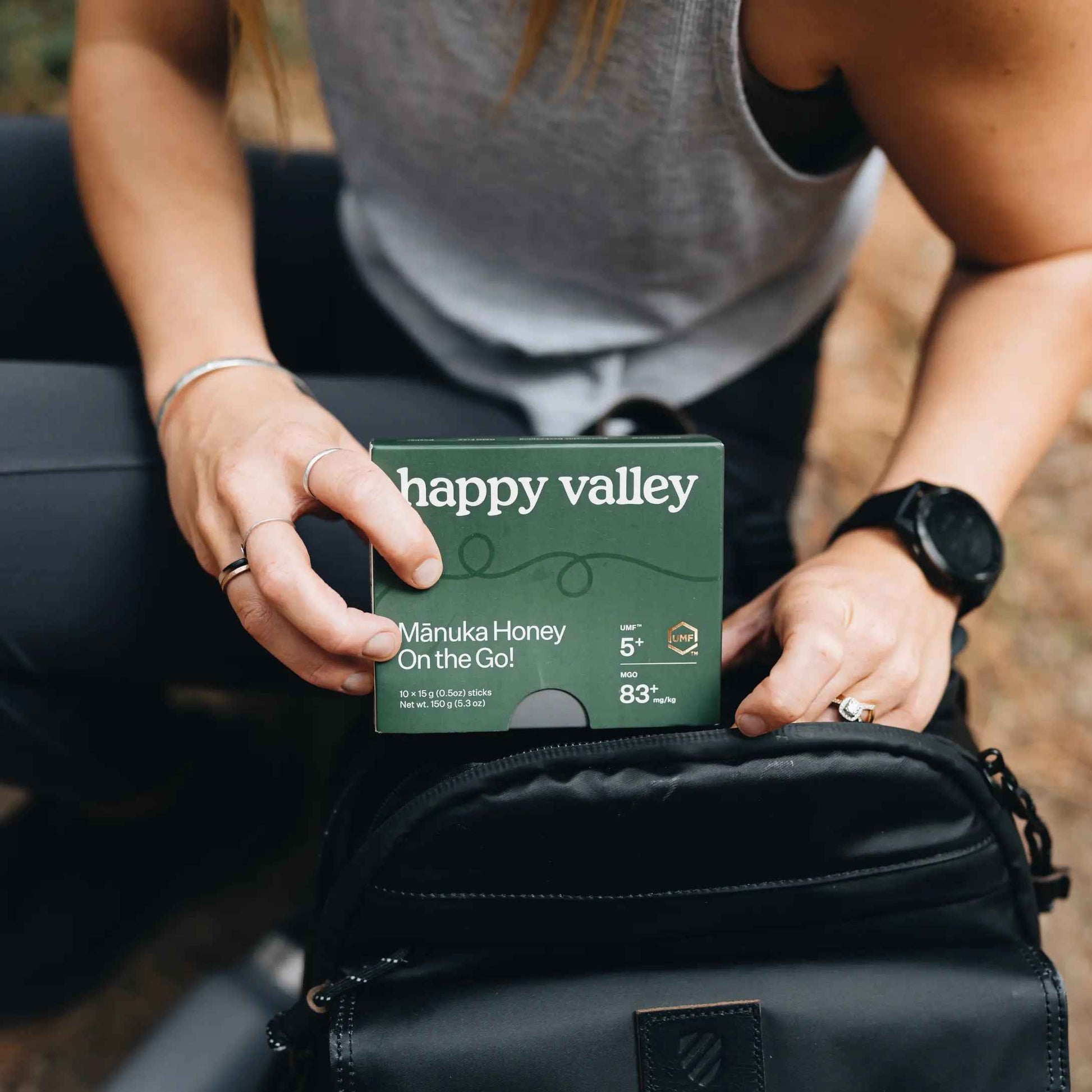 Pack of Happy Valley Honey UMF 5+ Manuka Honey sticks on the go, featuring individual honey packets with golden honey inside.
