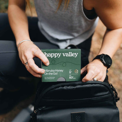 Pack of Happy Valley Honey UMF 5+ Manuka Honey sticks on the go, featuring individual honey packets with golden honey inside.