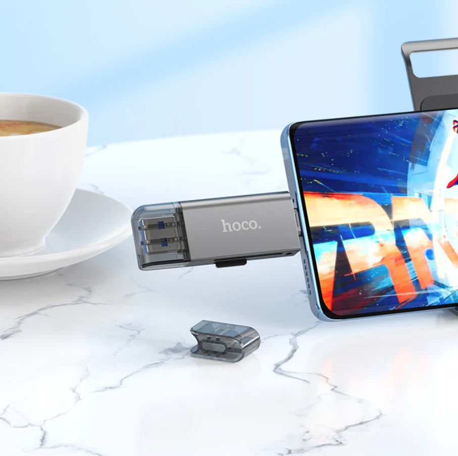 Techplus Hoco USB 3.0 Memory Card Reader with USB-A and USB-C dual plugs, shown connected to a computer device.