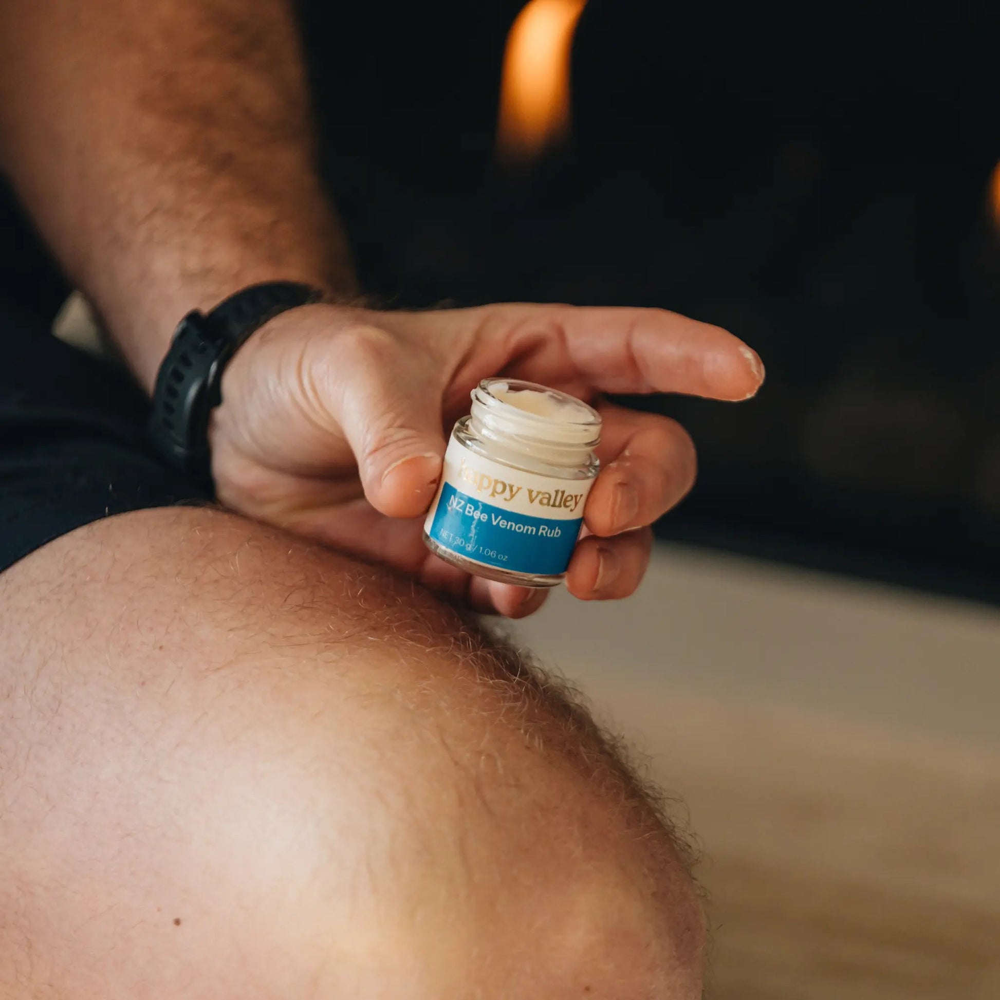 Bottle of Happy Valley Honey NZ Bee Venom Rub with label, showing bee venom product for skin relief.