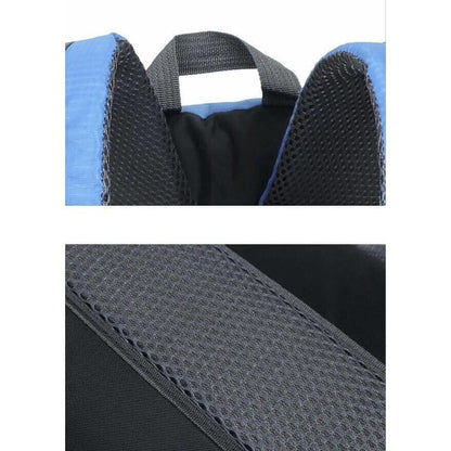 Black and grey 9eight5 backpack with adjustable straps, spacious design, and multiple compartments for everyday use.