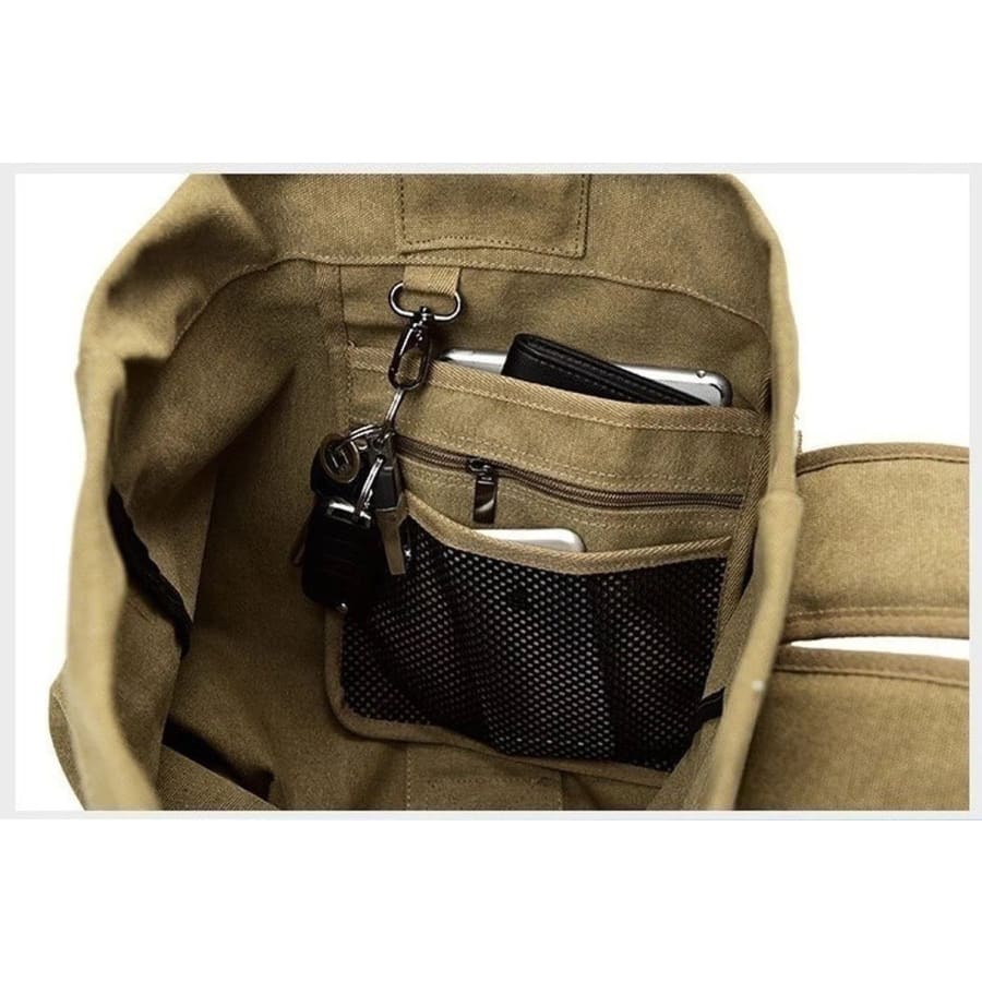9eight5 military-style khaki backpack with duffel bag design, featuring adjustable straps and spacious main compartment.