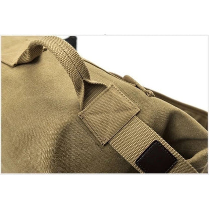 Khaki 9eight5 backpack duffel bag with military style, 55cm x 30cm x 20cm, featuring sturdy straps and multiple compartments.