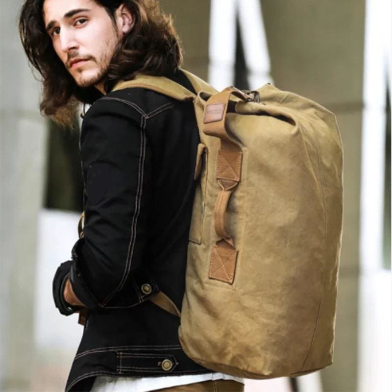 9eight5 khaki military-style backpack with duffel bag design, featuring sturdy straps and spacious interior for travel or daily use.