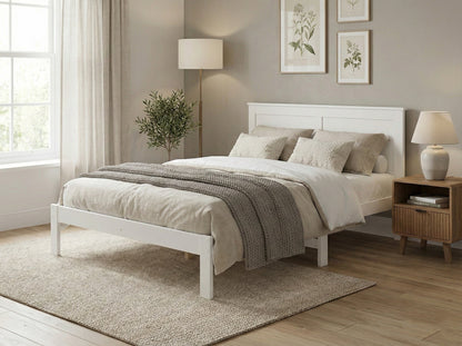 Solid pine double bed frame from Sue-E Furniture with sturdy construction and simple design, featuring a slatted headboard.