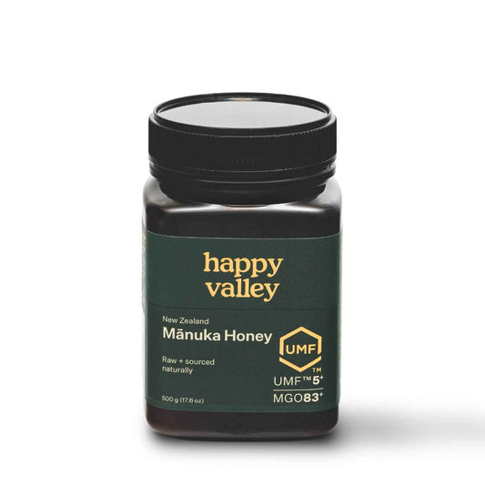 Jar of UMF 5+ Mānuka Honey by Happy Valley Honey, showcasing the honey's rich, golden color in a clear glass jar.
