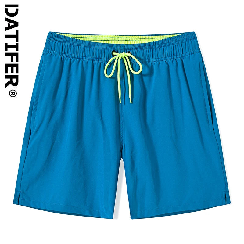 Men's classic polyester board shorts in black with a drawstring waist and side pockets, designed for comfort and beachwear.