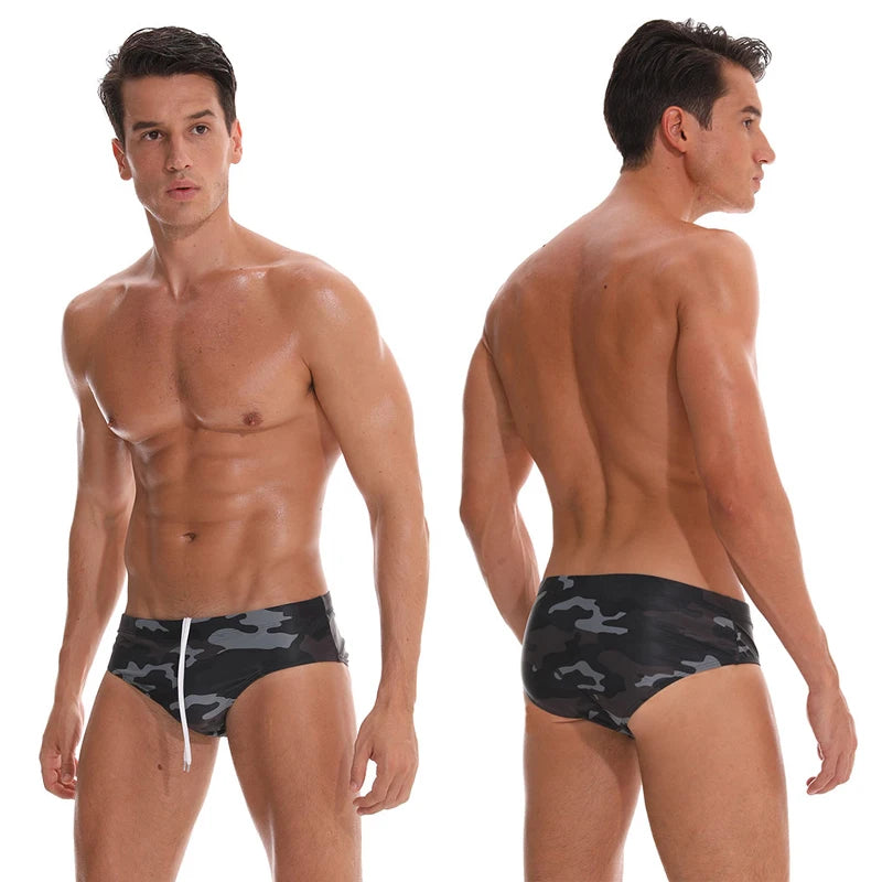 Men's low waist swim briefs with a bold print, featuring a sexy design from DATIFER, ideal for swimwear and beachwear.