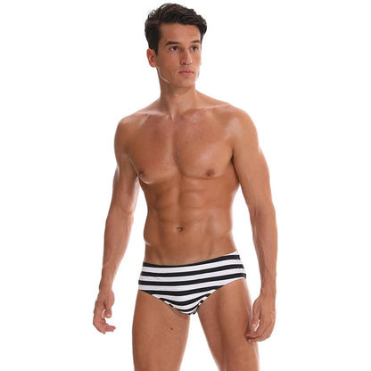 Men's navy swim briefs by ShopHub NZ, designed for comfort and performance during swimming activities.