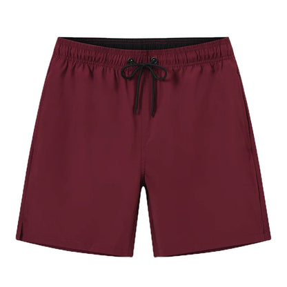 ShopHub NZ men's summer boardshorts with breathable mesh lining, adjustable waist, zipper pockets, quick-dry fabric, in vibrant colors.