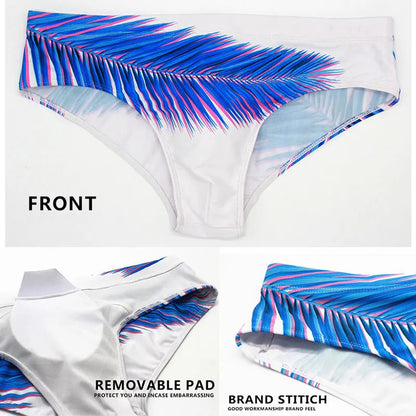 Men's low waist swim briefs with a bold print, designed for men’s swimwear by ShopHub NZ, featuring a vibrant and stylish pattern.