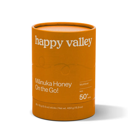 Pack of on-the-go multifloral Manuka honey sticks with MGO 50+ from Happy Valley Honey, featuring honey-filled sachets.