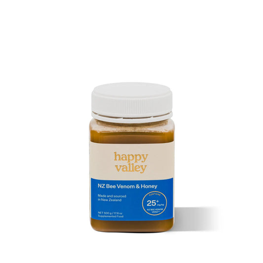 Jar of Happy Valley Honey bee venom supplement featuring a honeycomb label and golden honey inside.