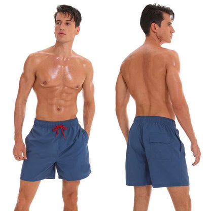 Men's beach boardshorts by ShopHub NZ featuring a sporty surfing style, lightweight fabric, and vibrant swimwear design.