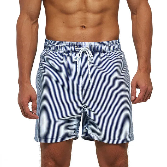 Men's summer boardshorts from ShopHub NZ, quick-dry polyester shorts with breathable mesh liner, ideal for gym and beach activities.