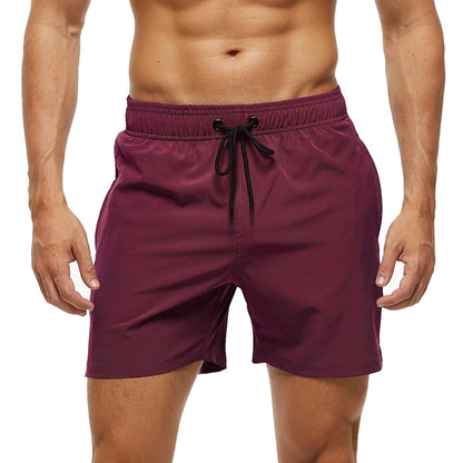 Men's DATIFER polyester board shorts with a classic design, featuring a vibrant pattern and adjustable waistband.