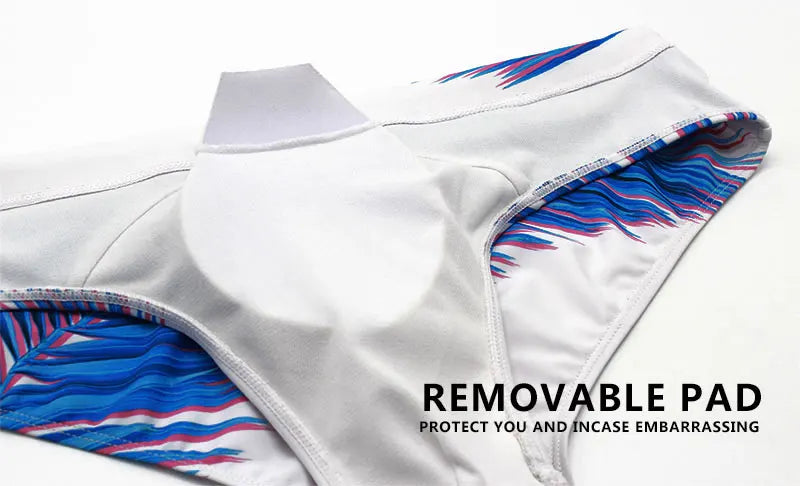 Men's low waist swim briefs with colorful print from DATIFER, designed for beach and pool swimwear, in a close-up image.