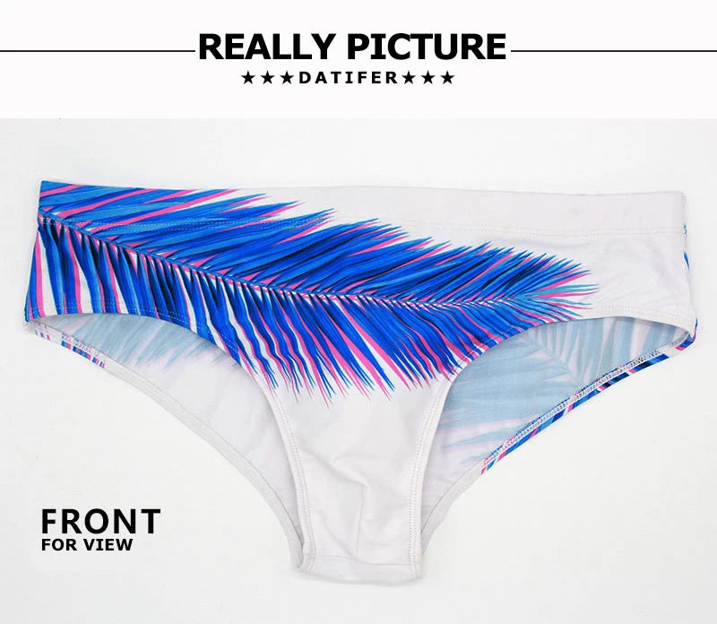 Men's low waist swim briefs with bold print design, made by ShopHub NZ, perfect for beach or poolside wear.