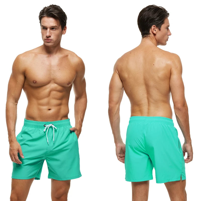 Men's summer swimming shorts by ShopHub NZ featuring quick-dry polyester, breathable mesh lining, a pocket, and solid color design.