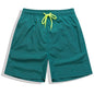 Men's beach boardshorts by ShopHub NZ featuring colorful surf-inspired patterns and a relaxed fit for swimming and beach activities.