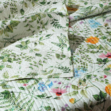 Reversible percale quilt set in garden walk pattern by Whites of London NZ, featuring soft, breathable cotton bedding for a cozy bedroom.