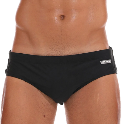 Men's low waist swim briefs with a colorful sexy print, designed for comfortable and stylish swimming.