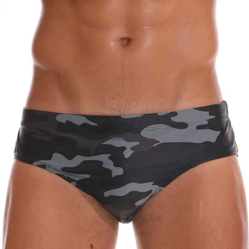 Men's low waist swim briefs with sexy print design, ShopHub NZ men's swimwear, vibrant and comfortable for beach or poolwear.