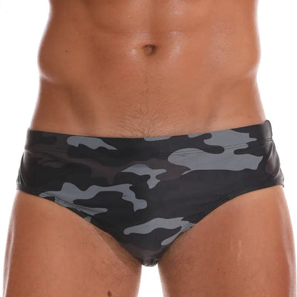 Men's low waist swim briefs with sexy print design, ShopHub NZ men's swimwear, vibrant and comfortable for beach or poolwear.