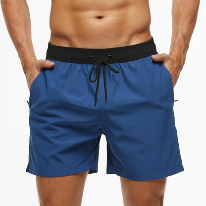 Men's summer swimming shorts by ShopHub NZ, quick-drying polyester with breathable mesh lining and a pocket, solid color design.