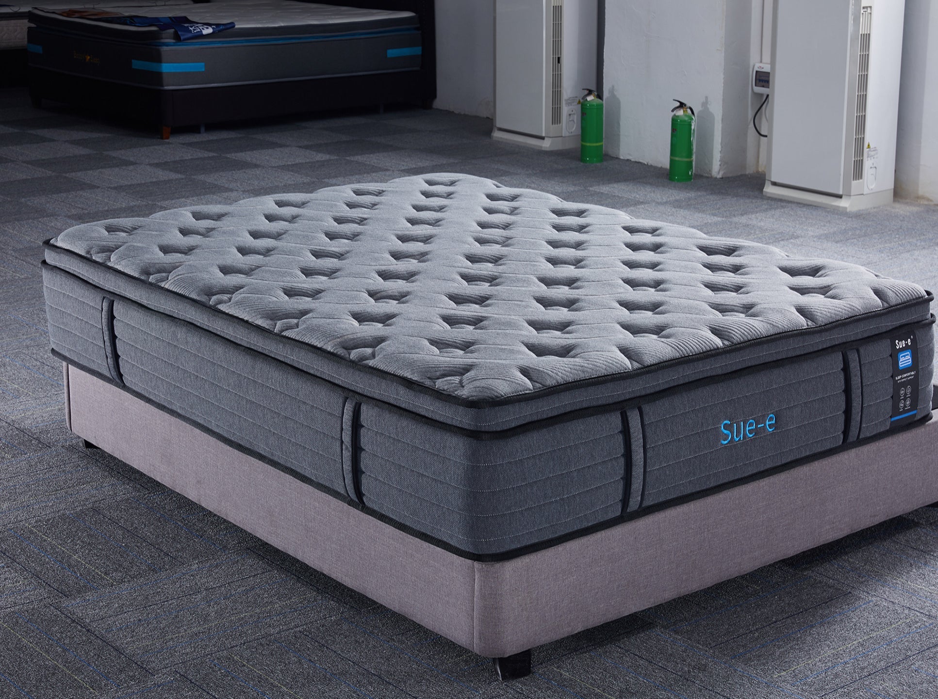 Comfortably 7 Zones Pocket Spring Mattress by sue-e furniture with a plush fabric cover and supportive design.