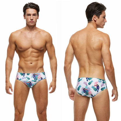 Men's low waist swim briefs by ShopHub NZ, featuring a snug fit and vibrant color, designed for comfortable swimming and beachwear.