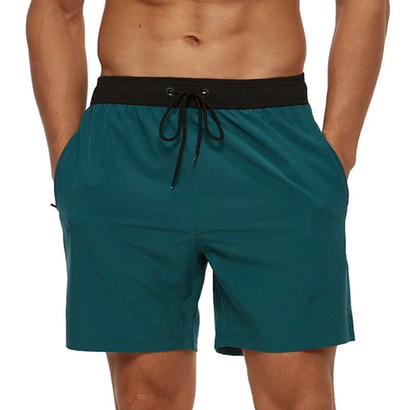 Men's summer swimming shorts by ShopHub NZ, quick-drying polyester with breathable mesh lining and a front pocket.