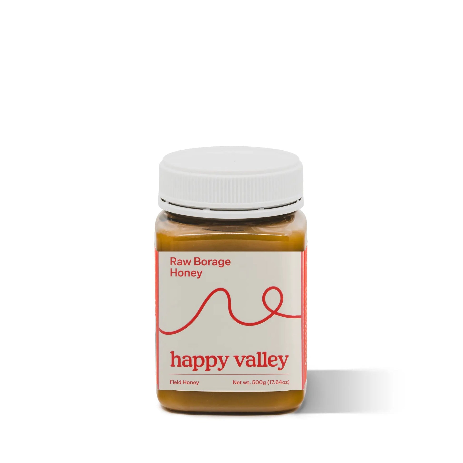 Jar of Happy Valley Honey Borage Field Honey, gourmet raw honey with golden color and floral honeycomb texture visible.