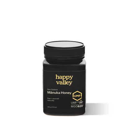 Jar of Happy Valley Honey Mānuka Honey UMF® 20+ with golden honey visible in a clear jar.