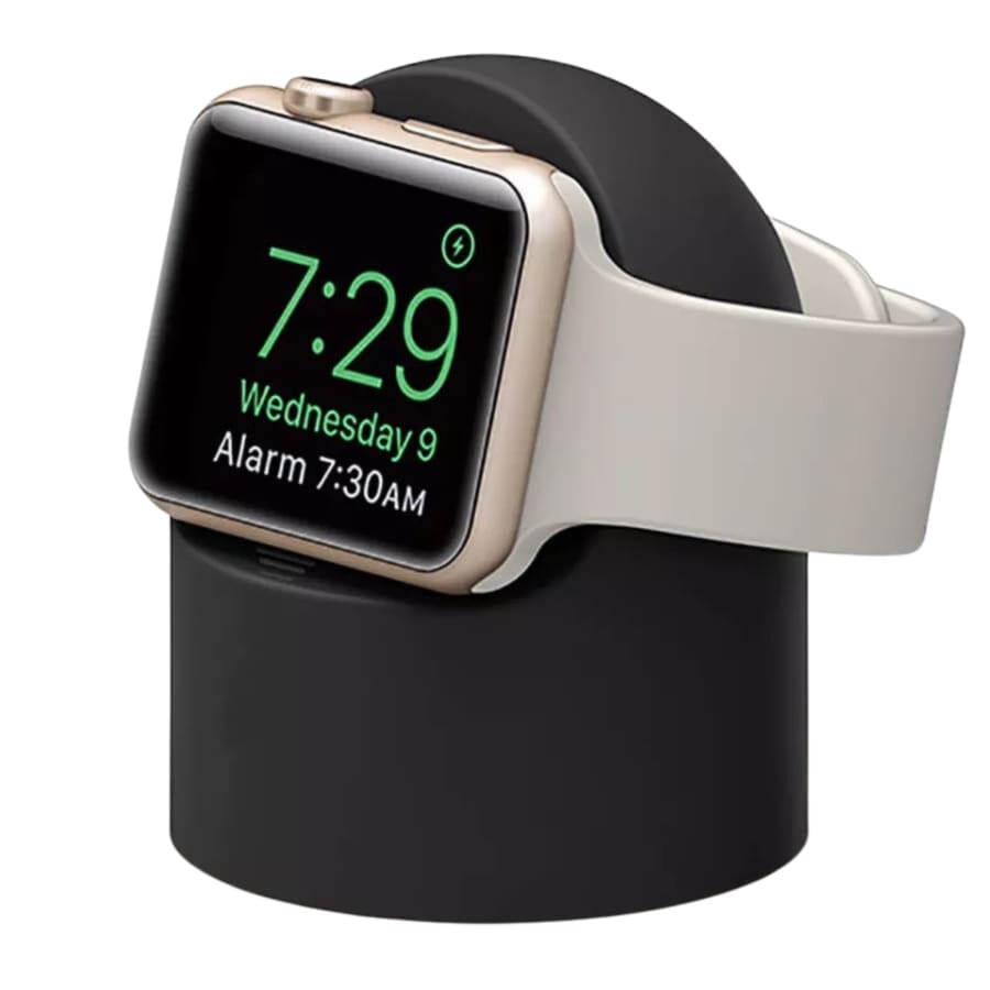 Apple Watch charging stand by That Watch Shop in six colors, shown holding an Apple Watch on a clean, modern desk setup.