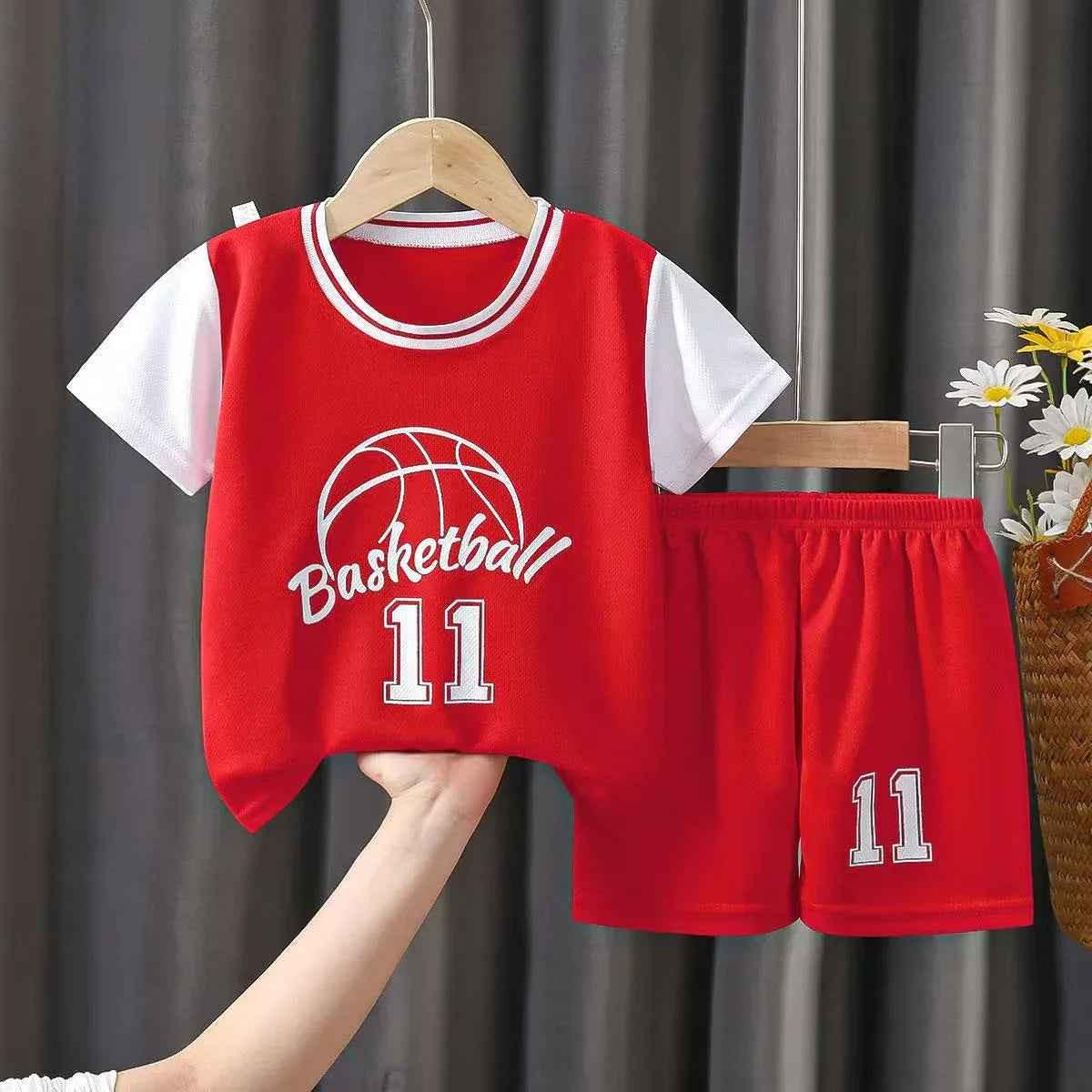 Baby Way NZ kids sportswear matching set with black basketball and netball tops for toddlers, perfect for active play.