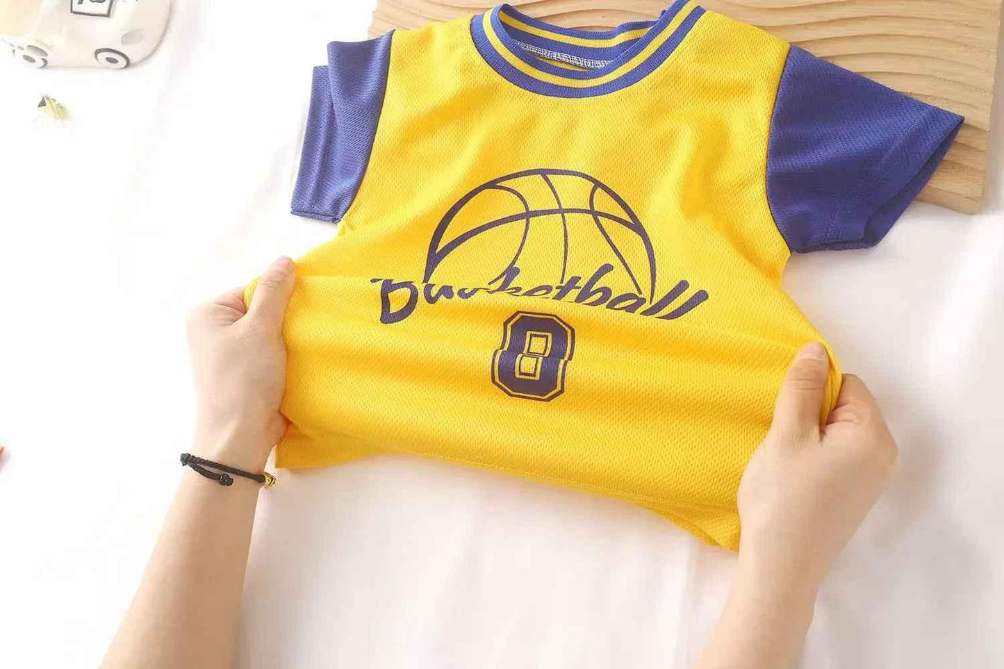 Baby Way NZ kids' sportswear matching set with black basketball and netball tops for toddlers, size 2, featuring athletic style.