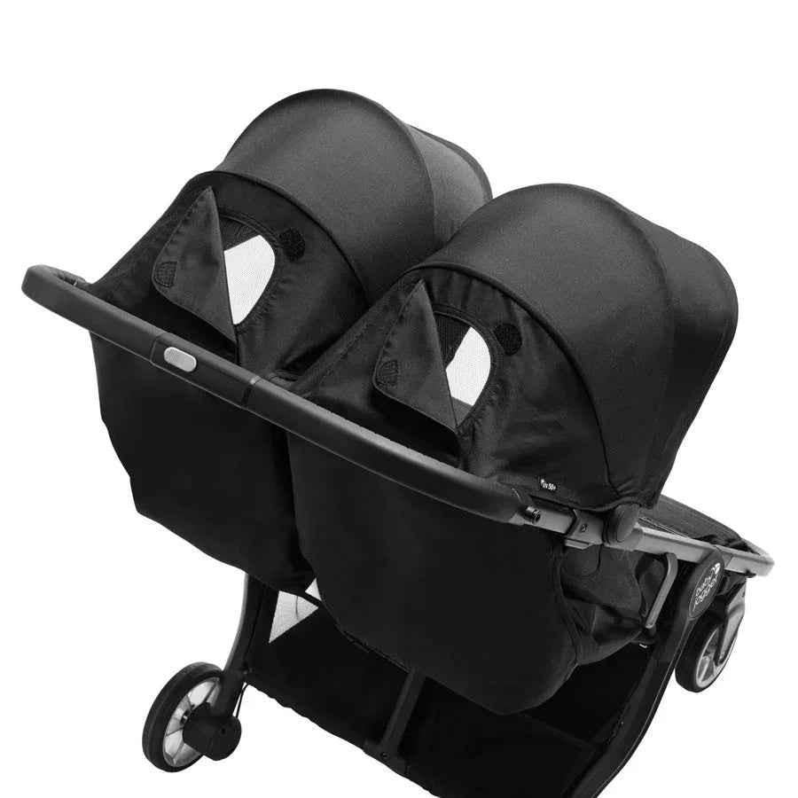 Baby Jogger City Tour 2 Compact Double Stroller in Pitch Black, lightweight and foldable double stroller for infants and toddlers.
