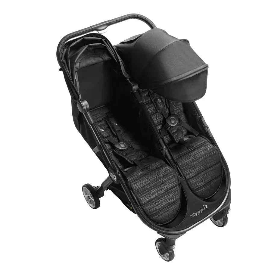 Baby Jogger City Tour 2 Compact Double Stroller in Pitch Black, lightweight and foldable double stroller for infants and toddlers.