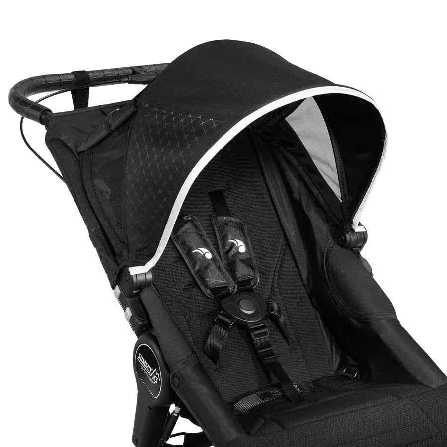 Baby Jogger Summit X3 jogging stroller in midnight black with sturdy frame and large wheels for outdoor running.