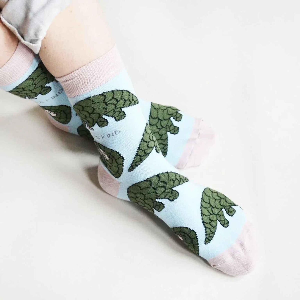 Barekind NZ bamboo socks featuring a Save the Pangolins design, made for adult sizes 4-7, crafted from sustainable bamboo material.