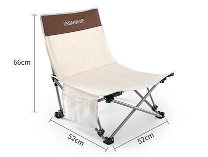 Green ECOTREK outdoor folding chair and lounger with padded seat, armrests, and adjustable back for versatile outdoor relaxation.